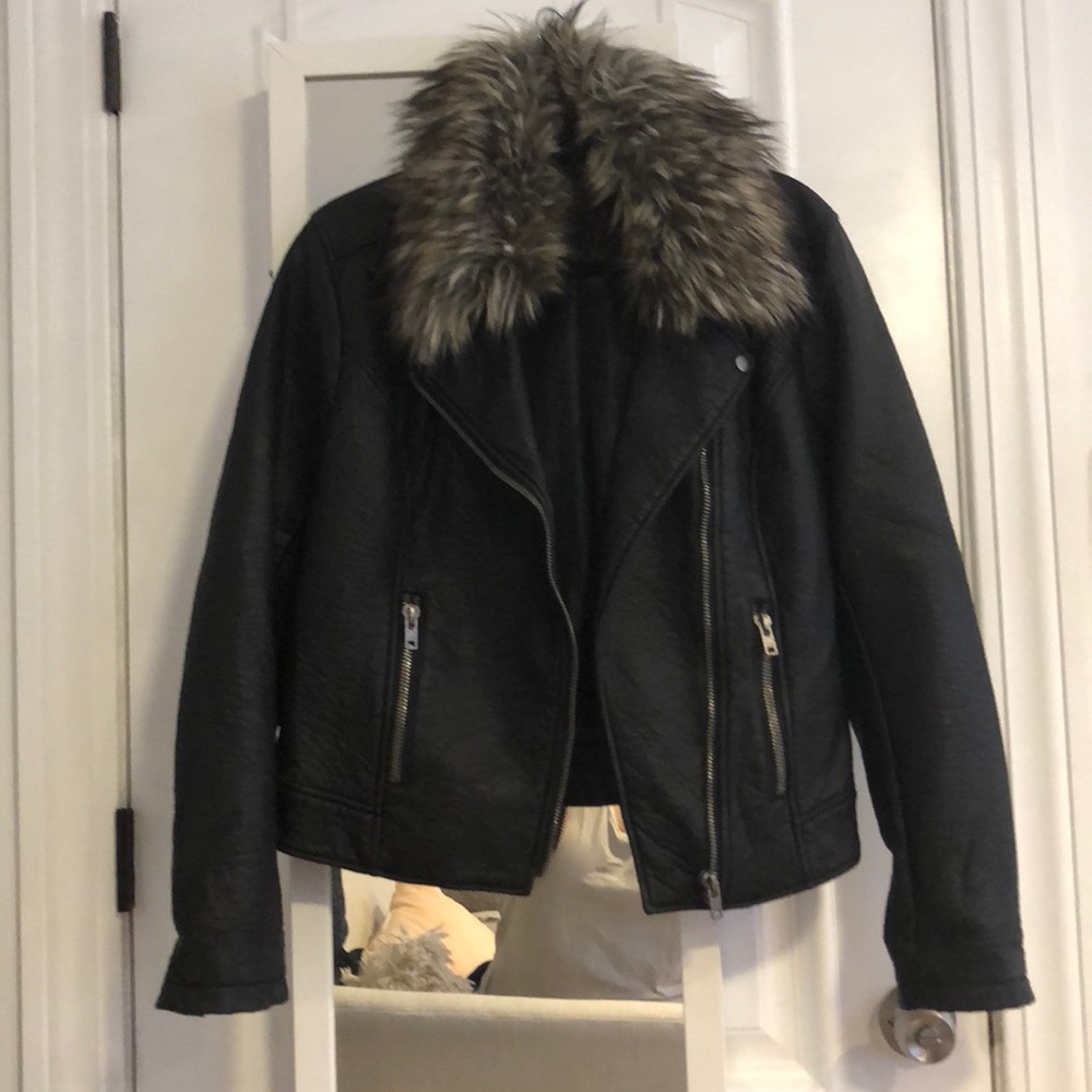 Leather jacket with fur collar